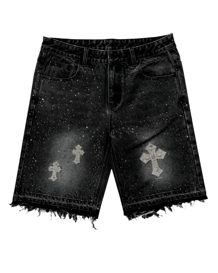 Black denim shorts with cross designs on a white background