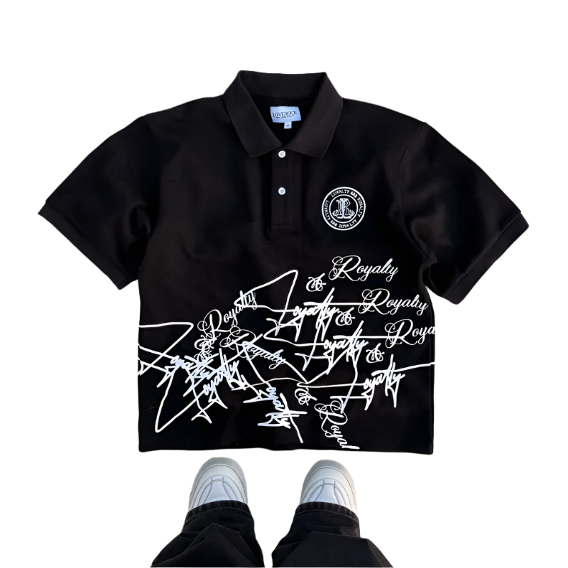 Black polo shirt with white text and logo on a concrete floor